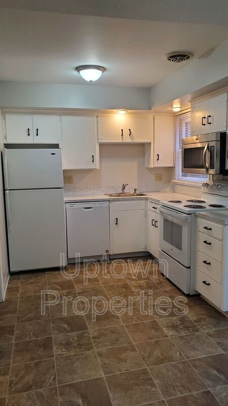 ***FIRST MONTH FREE***2BD/1.5BTH Townhome + Private Fenced Patio + W/D in unit + Parking Included property image