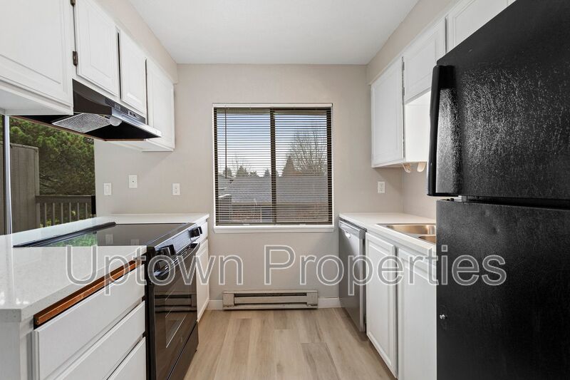 Top Floor Renovated 2BR/1.5Bath + W/D + Carport + Large Private Deck Included! property image
