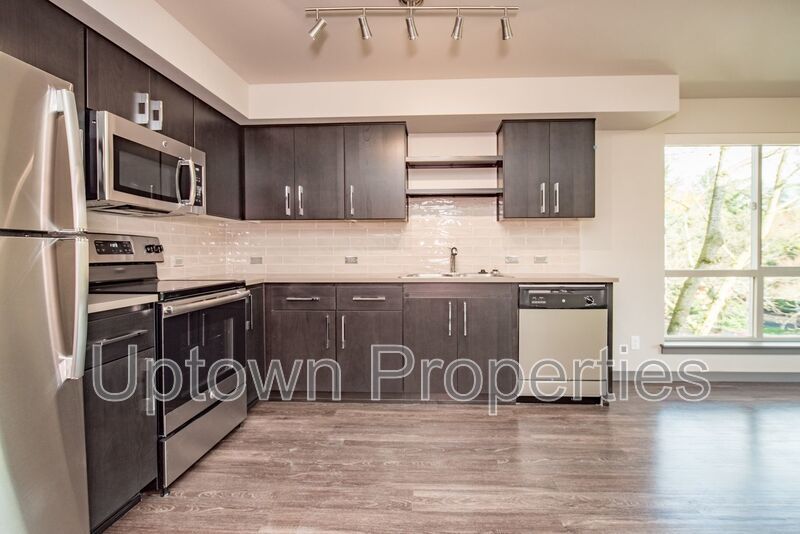 HUGE Ground Floor 1 bed + Corner Unit + A/C + W/D + Off Street Parking near OHSU! property image
