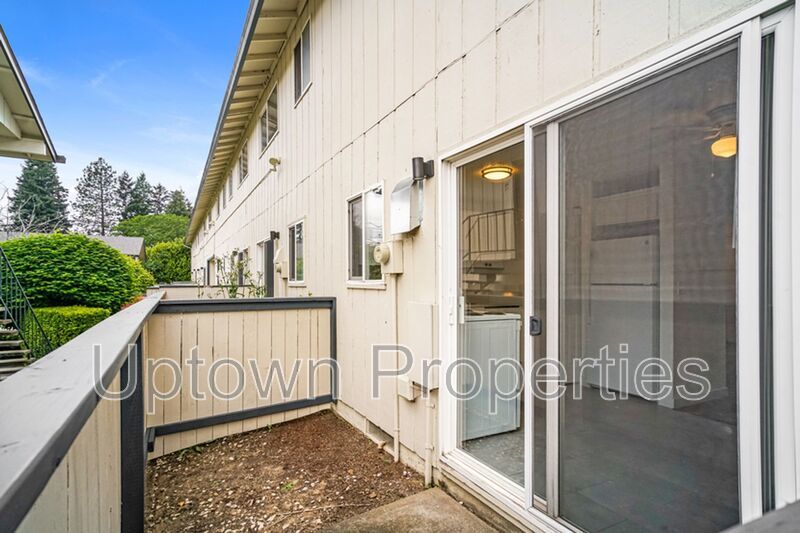 **June FREE RENT + $500 Security deposit + Application Fees Waived** Renovated 2 bed 1 bath Townhome w/ Private Yard - Wood Floors + Laundry Onsite - Walk to public transit!! property image