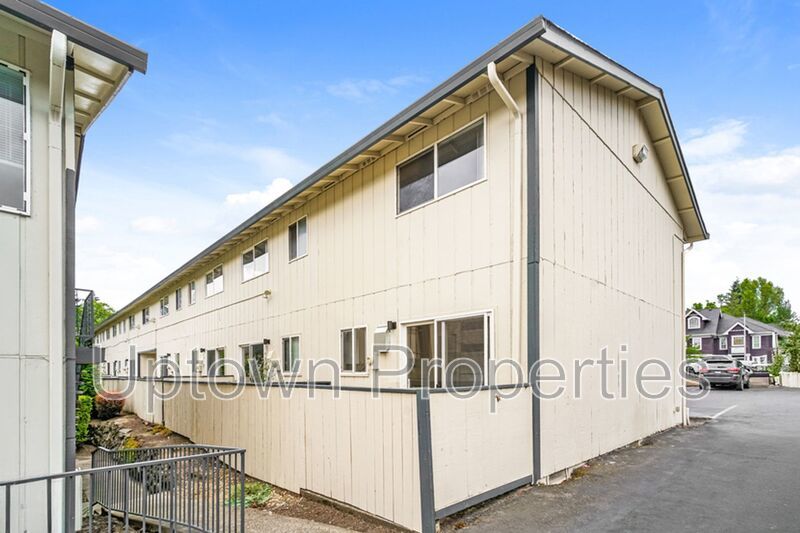 **June FREE RENT + $500 Security deposit + Application Fees Waived** Renovated 2 bed 1 bath Townhome w/ Private Yard - Wood Floors + Laundry Onsite - Walk to public transit!! property image