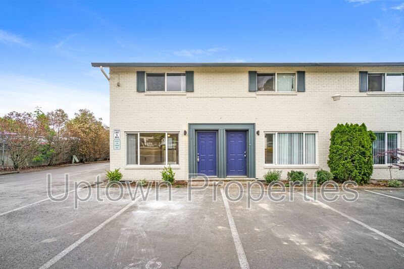 **June FREE RENT + $500 Security deposit + Application Fees Waived** Renovated 2 bed 1 bath Townhome w/ Private Yard - Wood Floors + Laundry Onsite - Walk to public transit!! property image
