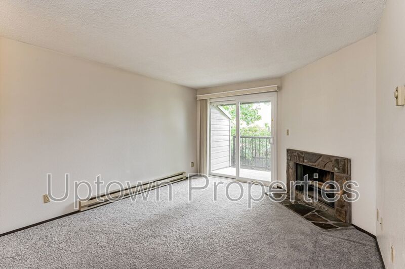 1BD 1BA Single Level Condo + Fireplace + 1 Car Garage + Fitness Center + Tennis Courts + Community Pool property image