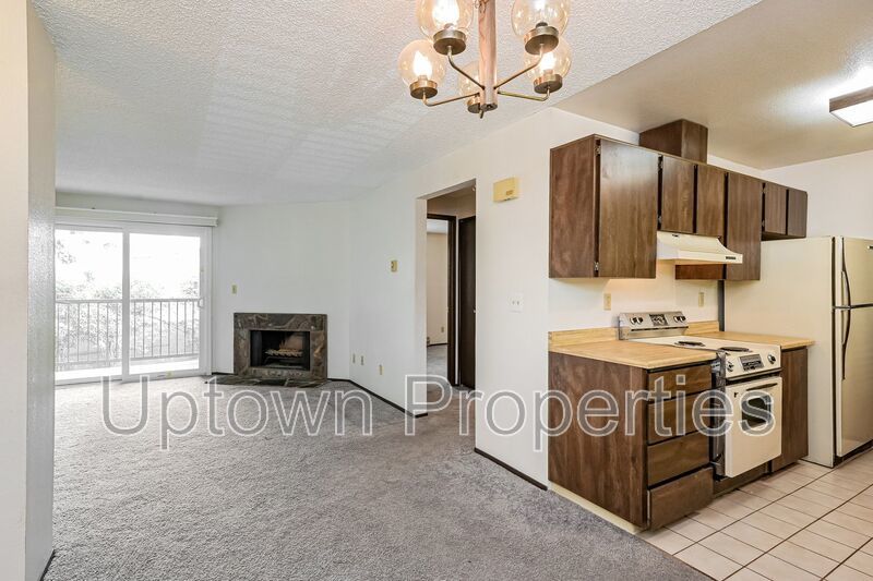 1BD 1BA Single Level Condo + Fireplace + 1 Car Garage + Fitness Center + Tennis Courts + Community Pool property image