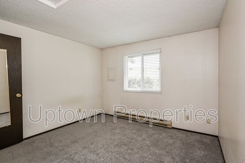 1BD 1BA Single Level Condo + Fireplace + 1 Car Garage + Fitness Center + Tennis Courts + Community Pool property image