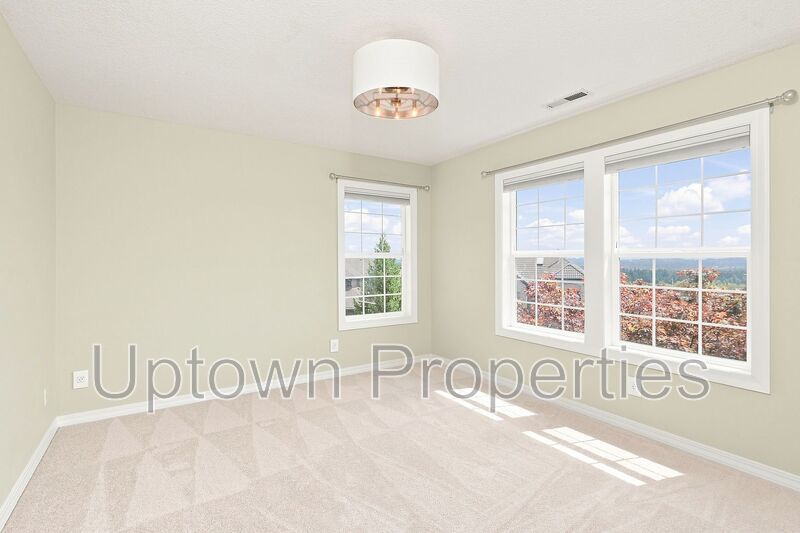 Bull Mountain Luxury! 4BD/2.5BTH + Office w/Sweeping Vista Views! 1 Car Garage + 3 Driveway Parking Spots + W/D Included + Fenced Yard + Pets Welcome!! property image