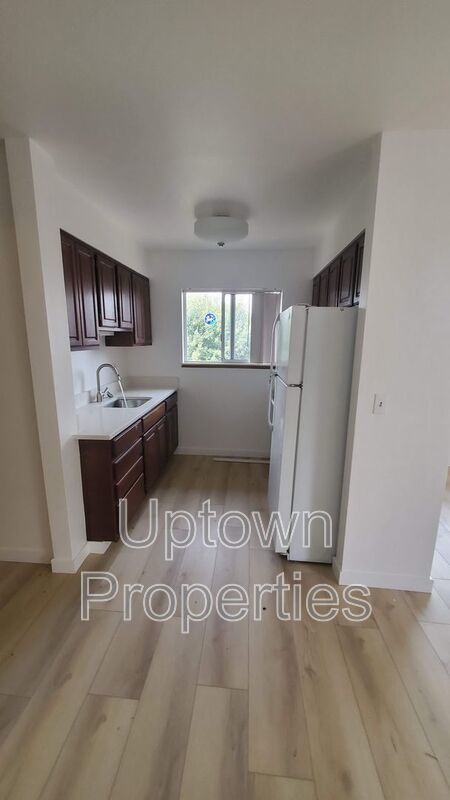 Renovated 2 bed 1 bath + Wood Floors + Assigned Parking! property image