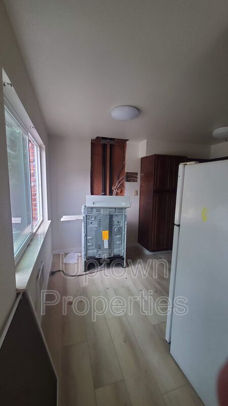 Renovated 2 bed 1 bath + Wood Floors + Assigned Parking! property image