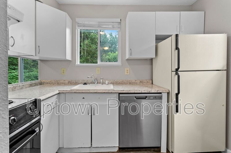 Vista Hills Creekside End Unit 2 Bed/1.5 Bath Townhome + W/D Included + Wood Flooring + Private Deck + Pets Welcome!! property image