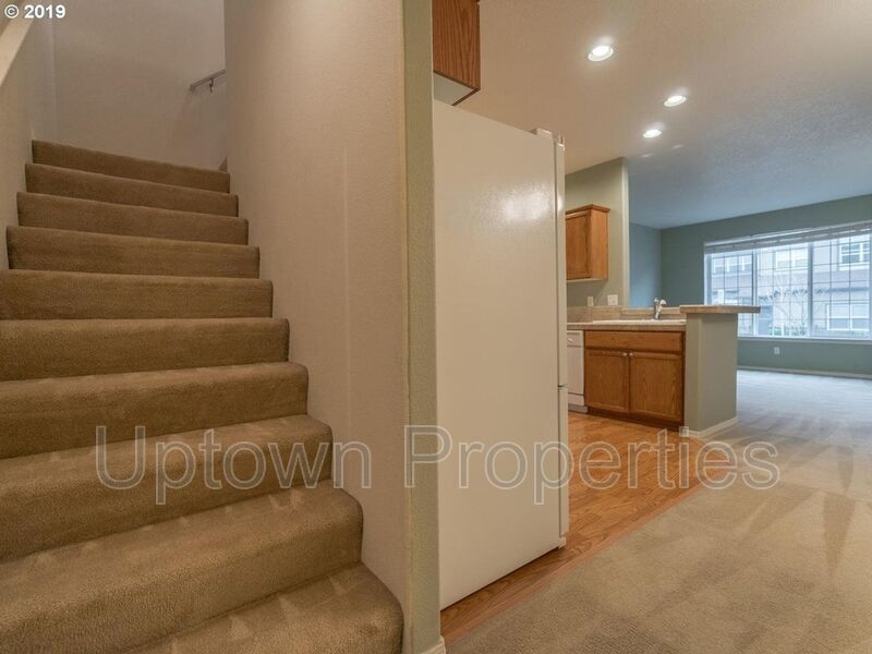 Beautiful Elmonica 3BR/2.5BA Townhouse w/ Front Fenced Patio + 2-Car Garage + Clubhouse/Fitness Center + W/D + Pets Welcome!! property image