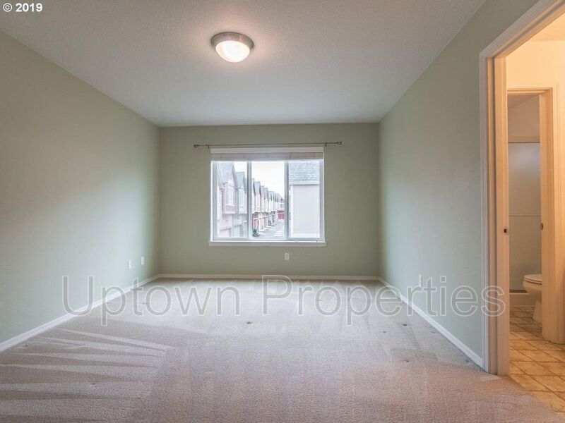 Beautiful Elmonica 3BR/2.5BA Townhouse w/ Front Fenced Patio + 2-Car Garage + Clubhouse/Fitness Center + W/D + Pets Welcome!! property image