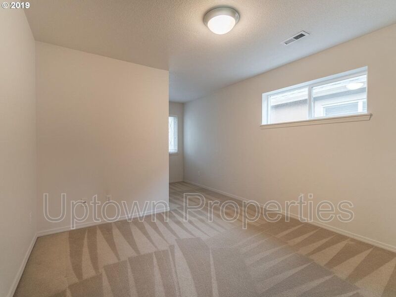 Beautiful Elmonica 3BR/2.5BA Townhouse w/ Front Fenced Patio + 2-Car Garage + Clubhouse/Fitness Center + W/D + Pets Welcome!! property image