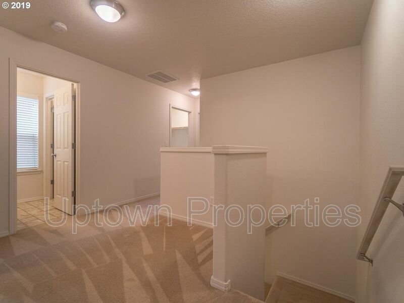 Beautiful Elmonica 3BR/2.5BA Townhouse w/ Front Fenced Patio + 2-Car Garage + Clubhouse/Fitness Center + W/D + Pets Welcome!! property image