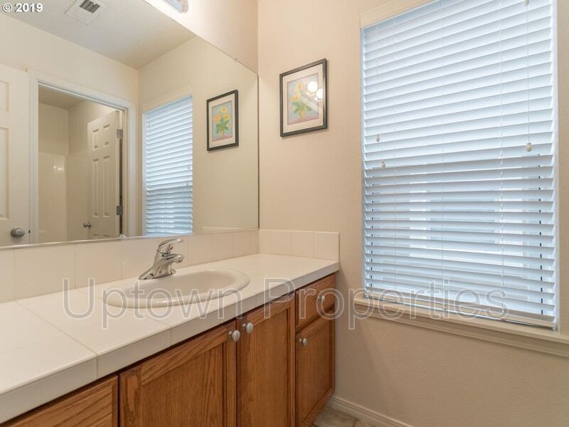 Beautiful Elmonica 3BR/2.5BA Townhouse w/ Front Fenced Patio + 2-Car Garage + Clubhouse/Fitness Center + W/D + Pets Welcome!! property image