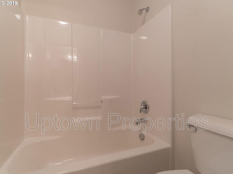 Beautiful Elmonica 3BR/2.5BA Townhouse w/ Front Fenced Patio + 2-Car Garage + Clubhouse/Fitness Center + W/D + Pets Welcome!! property image